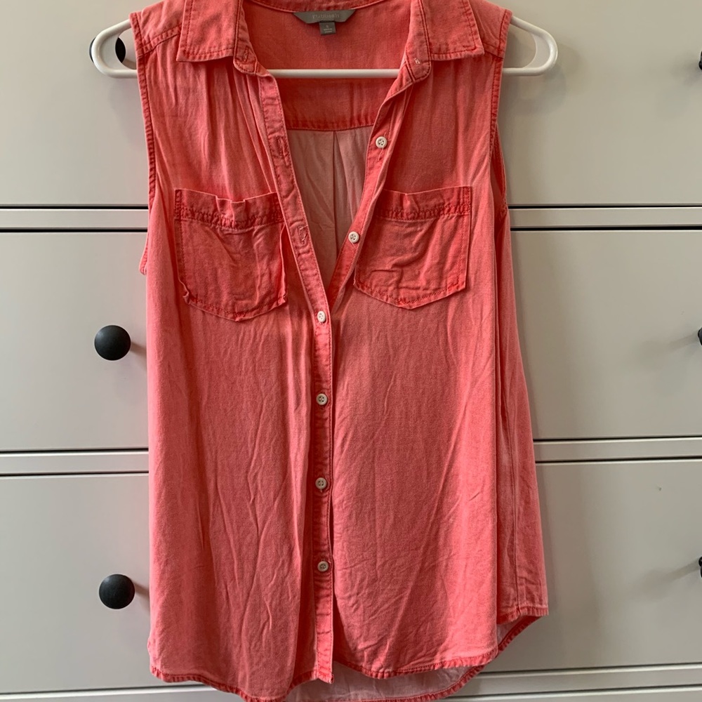 Pink sleeveless button up blouse